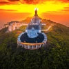 Tượng Phật Di Lặc Núi Bà Đen: Kỳ Quan Đá Sa Thạch Độc Đáo